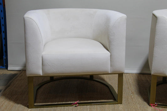 White barrel chairs with brass base made by Interdesign